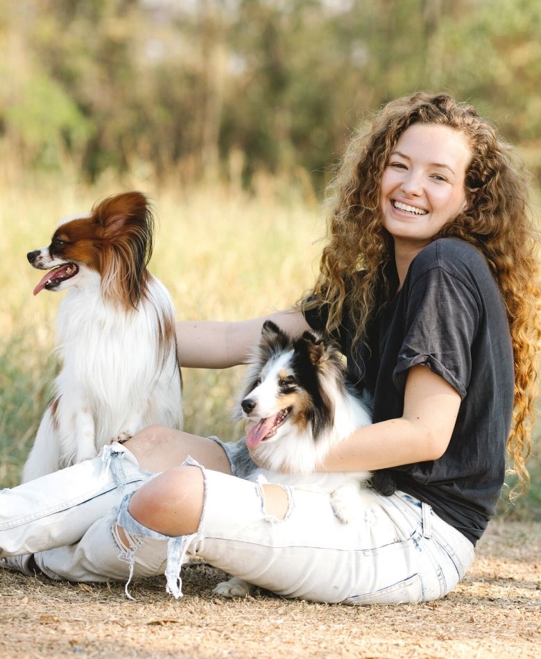 woman with two dogs
